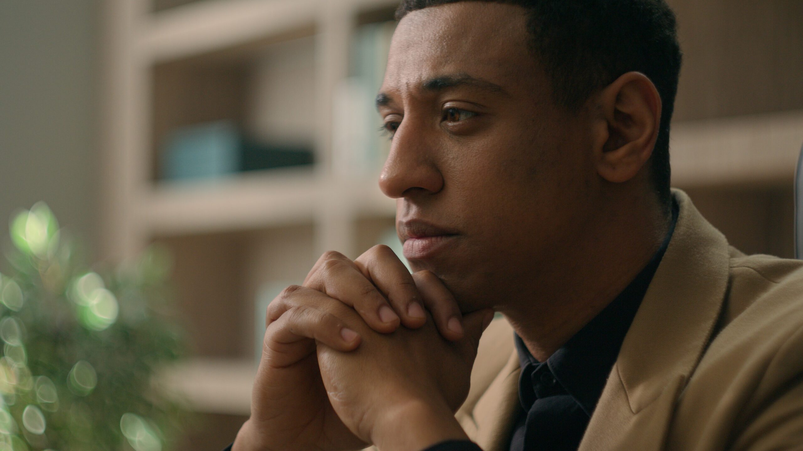 close-up of the man pausing/thinking
